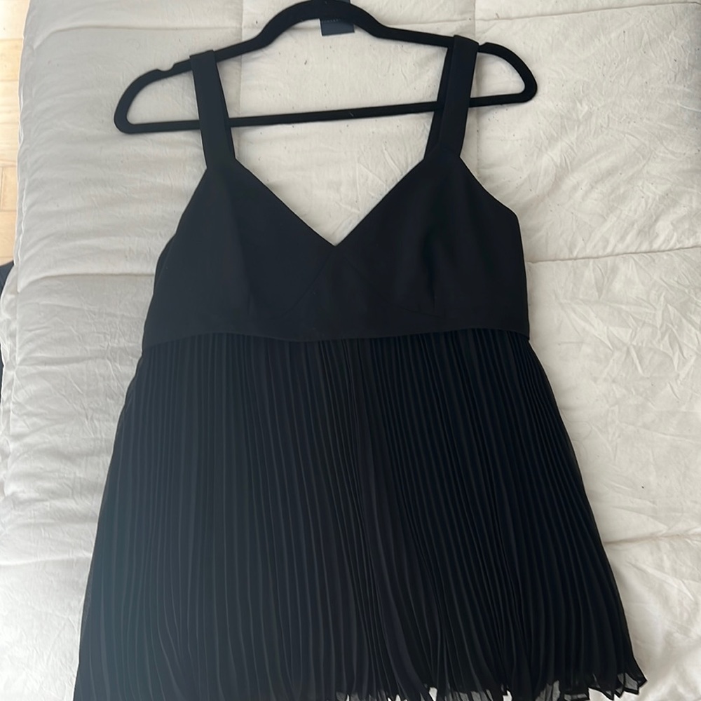 Black cocktail blouse with ruffles - never worn